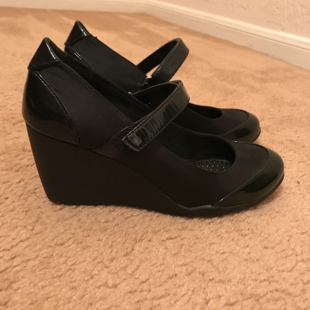 Black Mary Jane style shoe with wedge heel